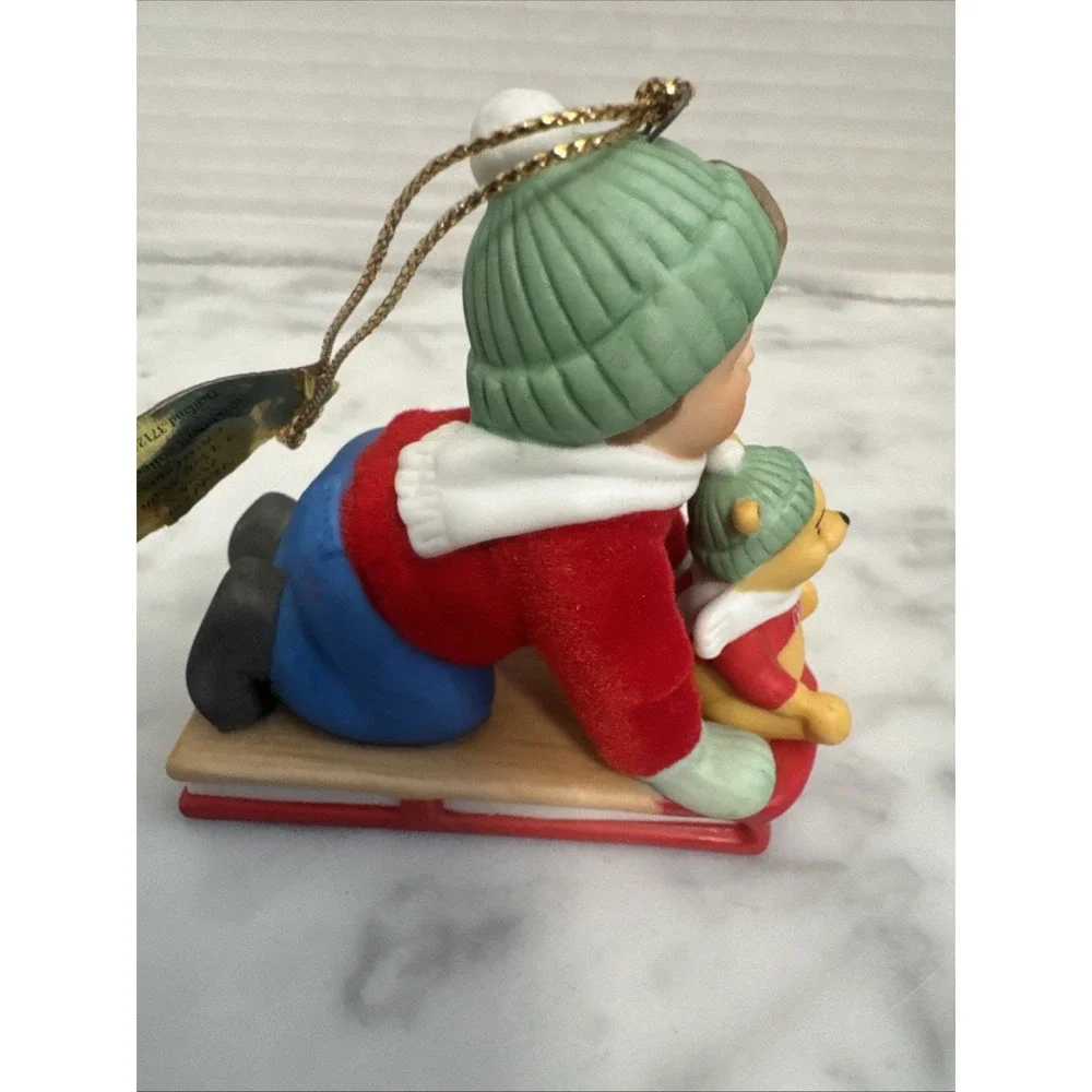 Disney Ashton Drake ornament Hold on Pooh sled ceramic and felt boy sledding‎